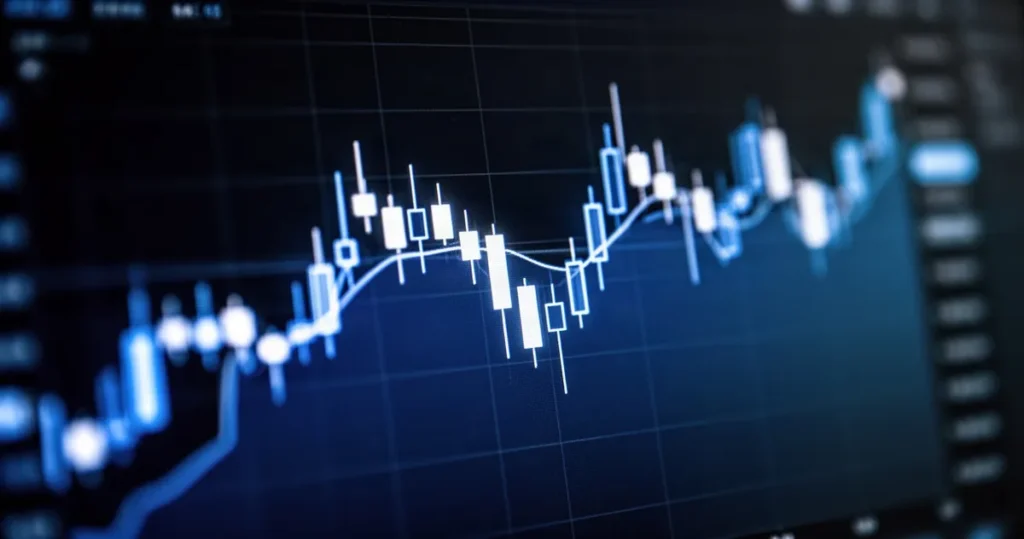 Wyniki finansowe Taurona za II kwartał 2026 roku. Spółka podała dane o zyskach Niebiesko-biały wykres giełdowy na ciemnym tle, przedstawiający trendy finansowe.