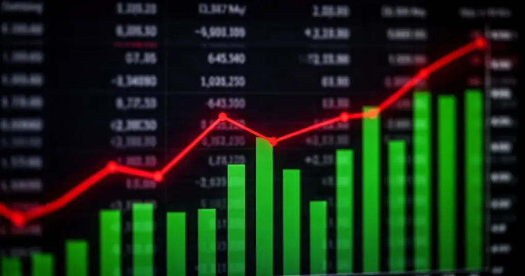 Wykres finansowy z czerwoną linią spadkową i zielonymi słupkami na ciemnym tle, w tle rozmyte kolumny liczb.